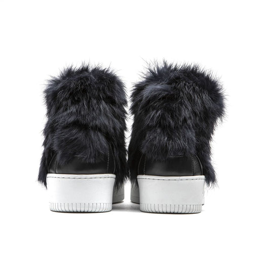 Pair of women's sneakers with white soles, blue cotton upper and fur trim