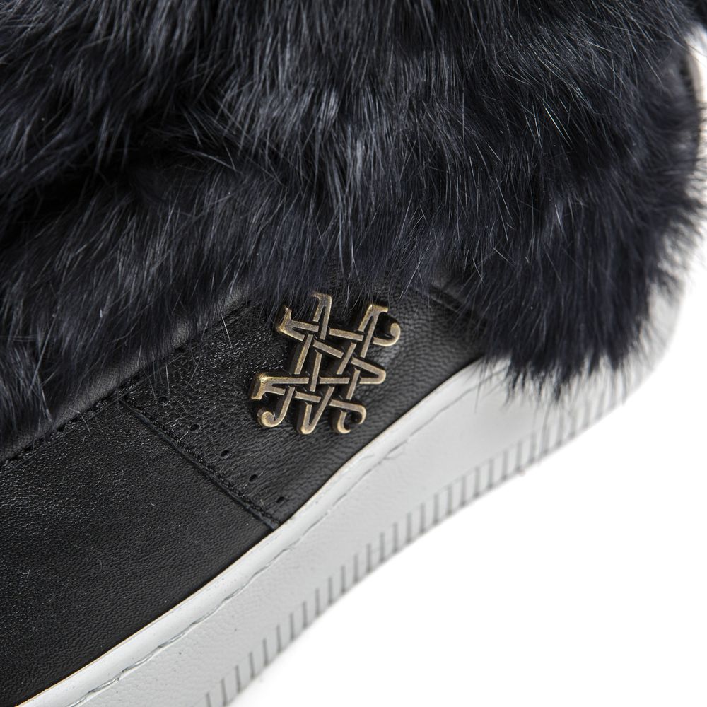 Black sneaker with gold cross design on side