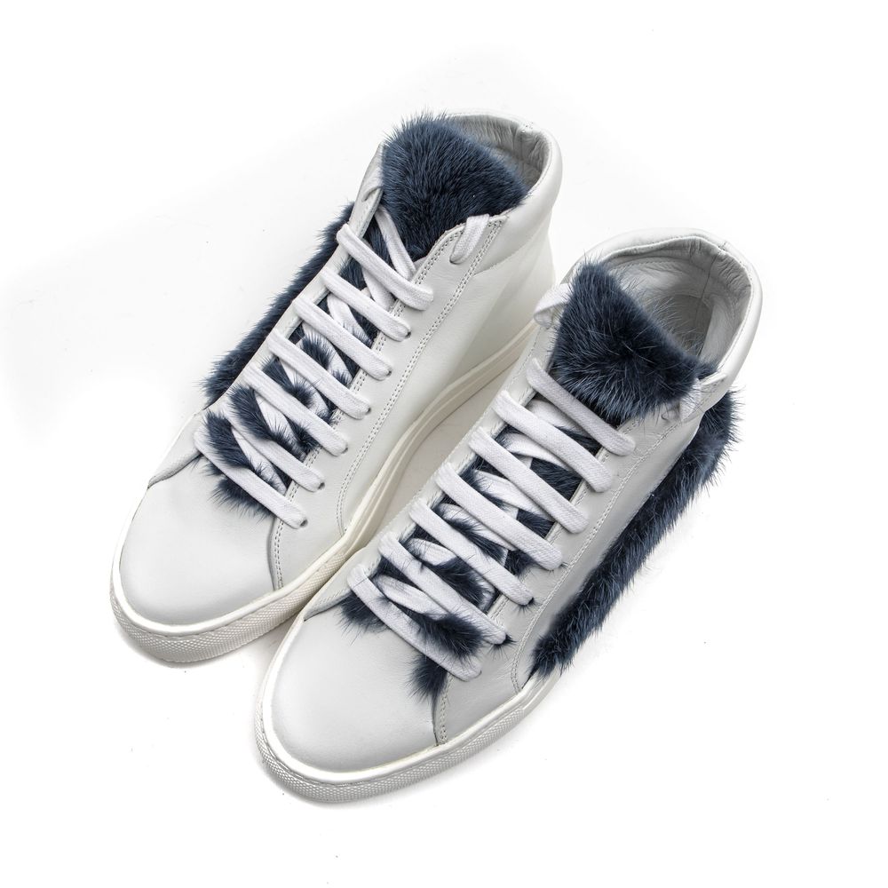 Pair of white leather sneakers with blue fur trim, laces, and soles