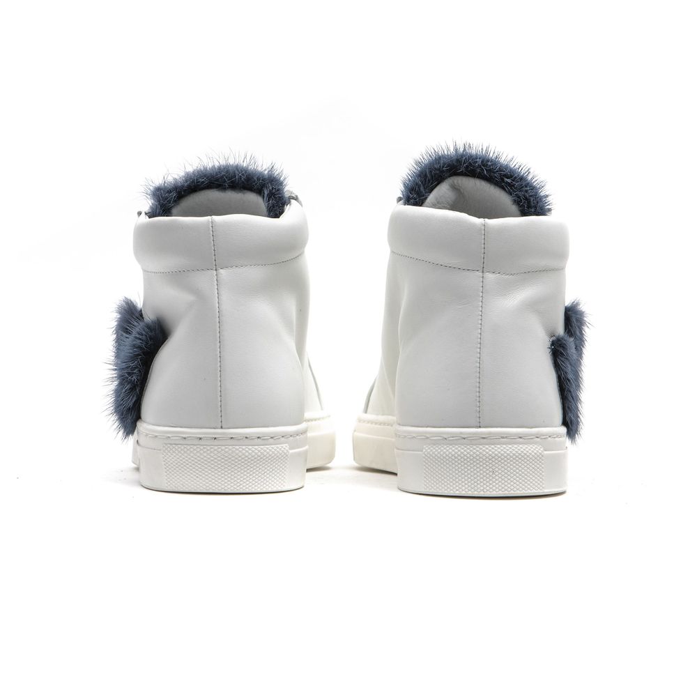 Pair of white leather women's sneakers with blue fur trim
