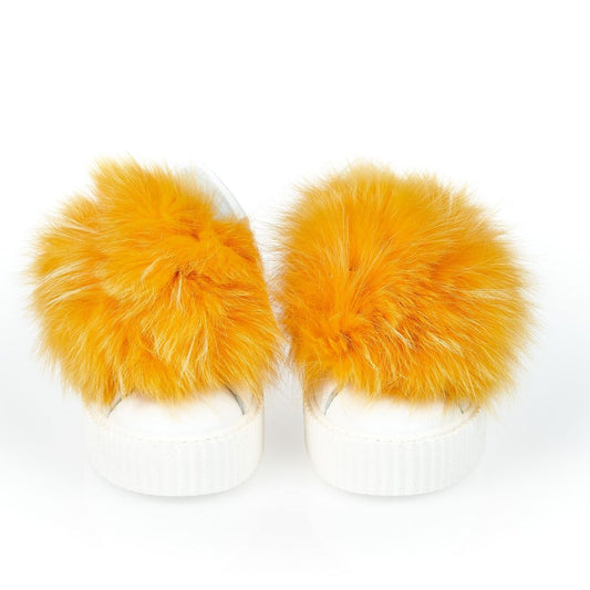Yellow fur pom pom shoes with white soles