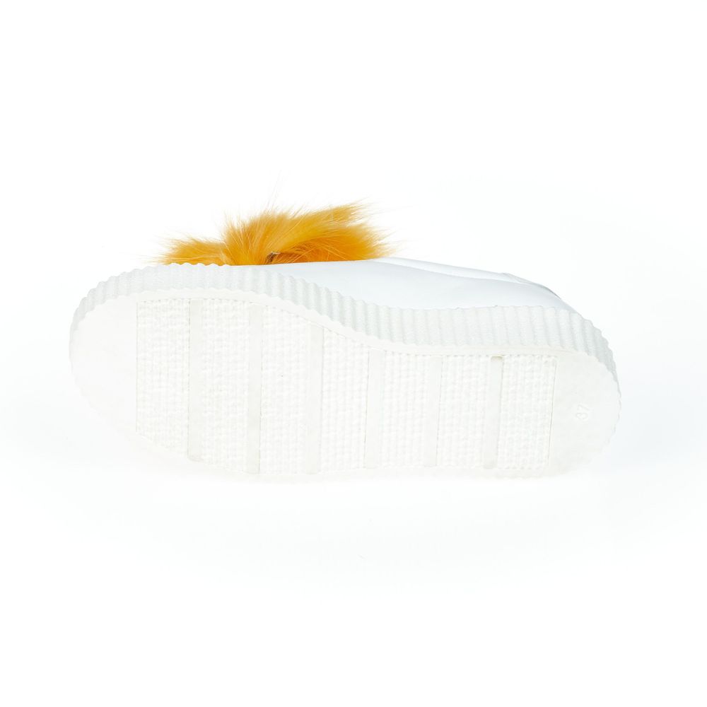 A white textile women's sneaker with real fur pom poms on the sole