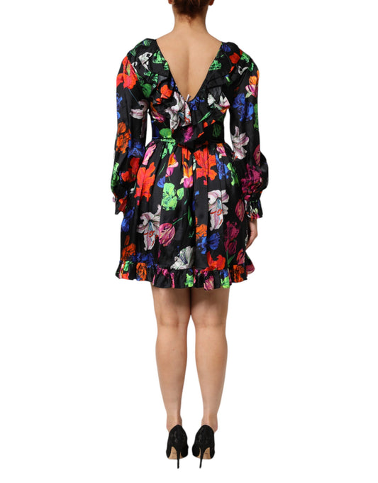 A black dress with a floral pattern and ruffled sleeves