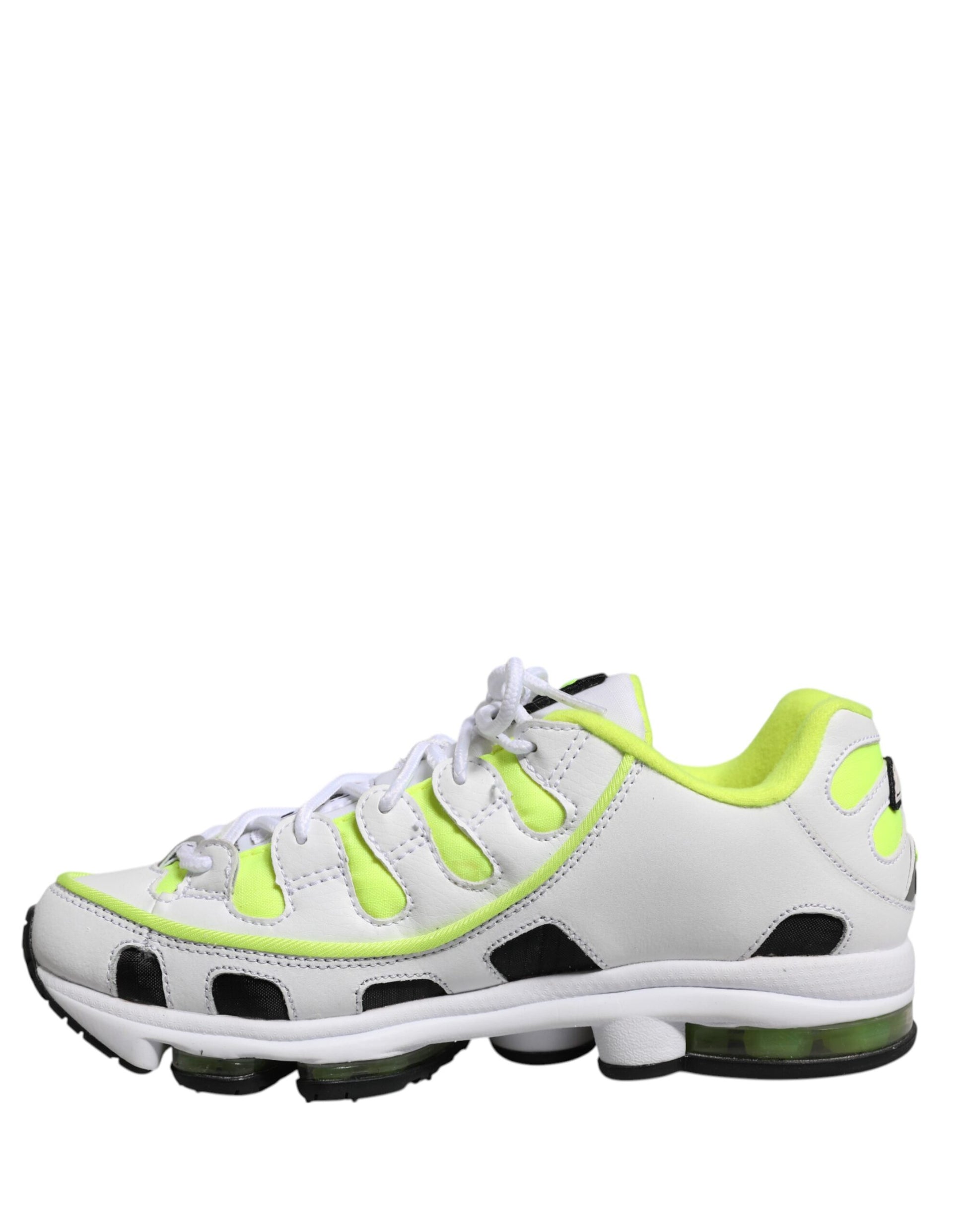 White and yellow athletic shoe with laces