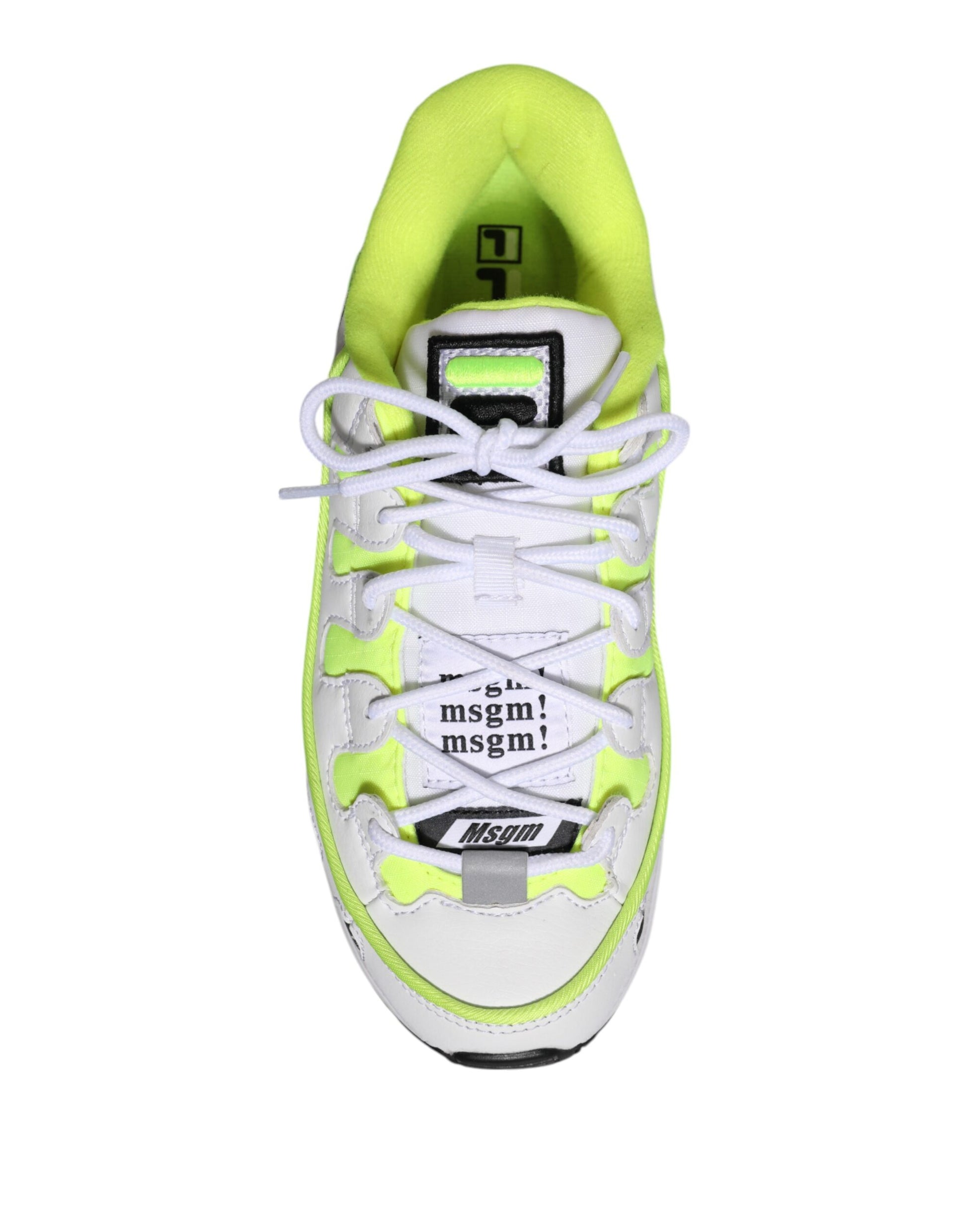White and yellow sneaker with black laces