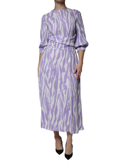 A long sleeve dress with a white purple pattern, made of viscose
