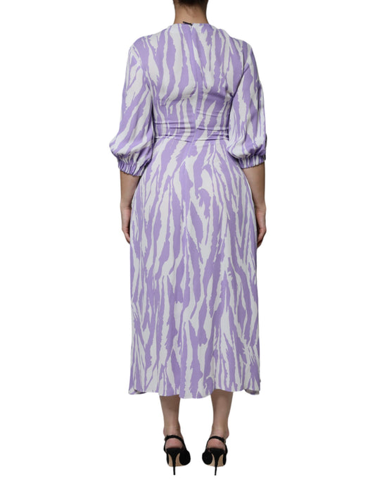 A long purple dress with white pattern, featuring short sleeves and a maxi length