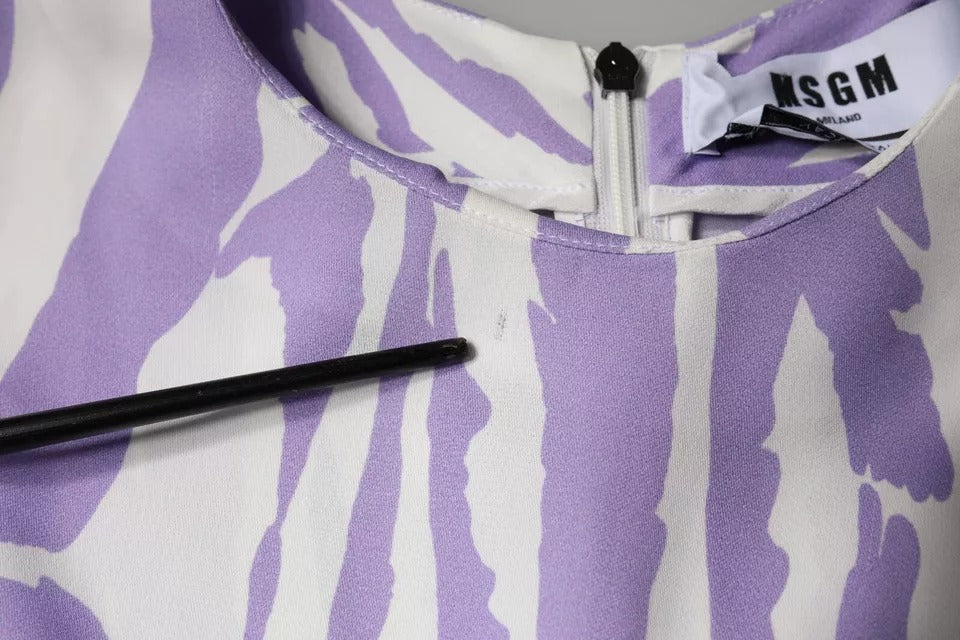 A white and purple patterned viscose maxi dress with short sleeves