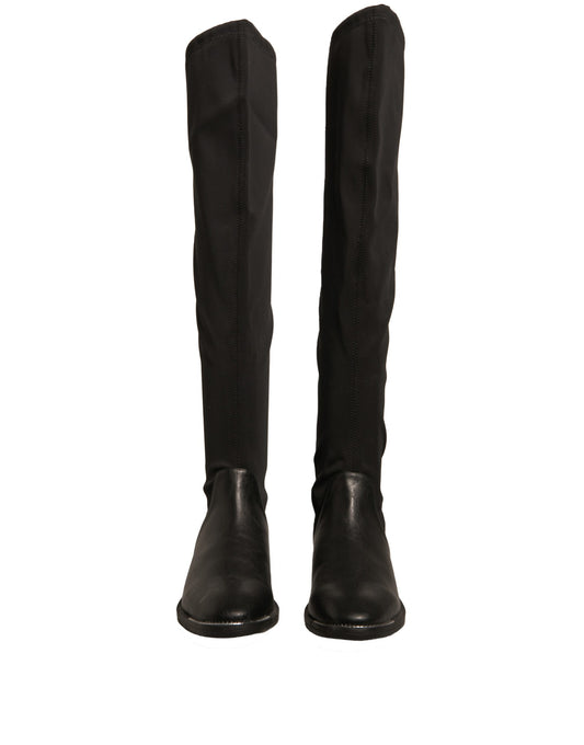 Pair of black knee high boots