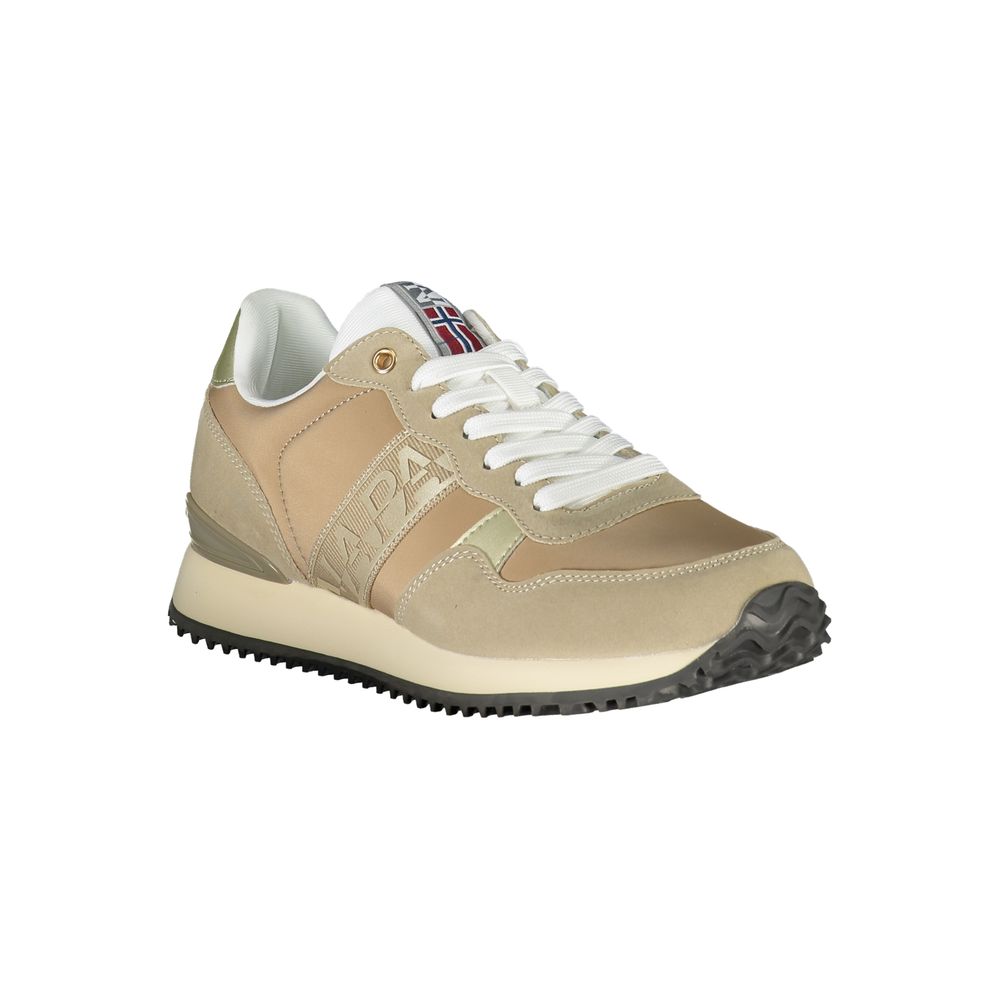 Tan women's sneakers with white laces, logo on tongue, and black sole