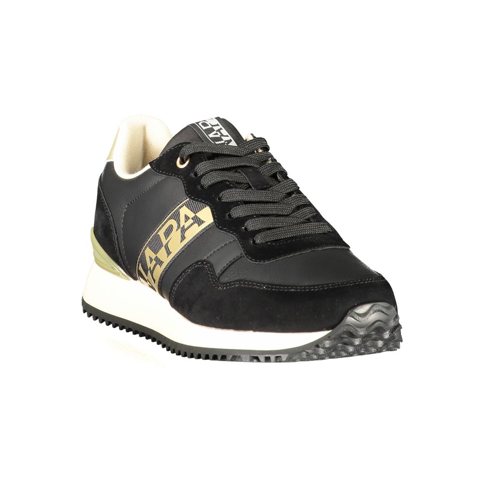 Black and white women's sneaker with gold accents, featuring a chunky sole and brand logo