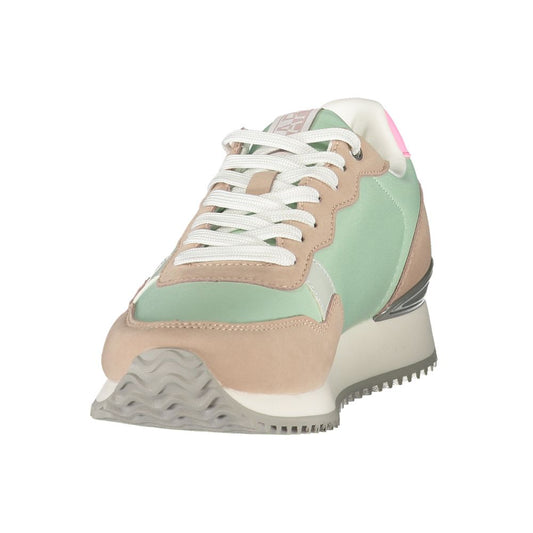 A women's sneaker with a green upper, white laces, and a black sole
