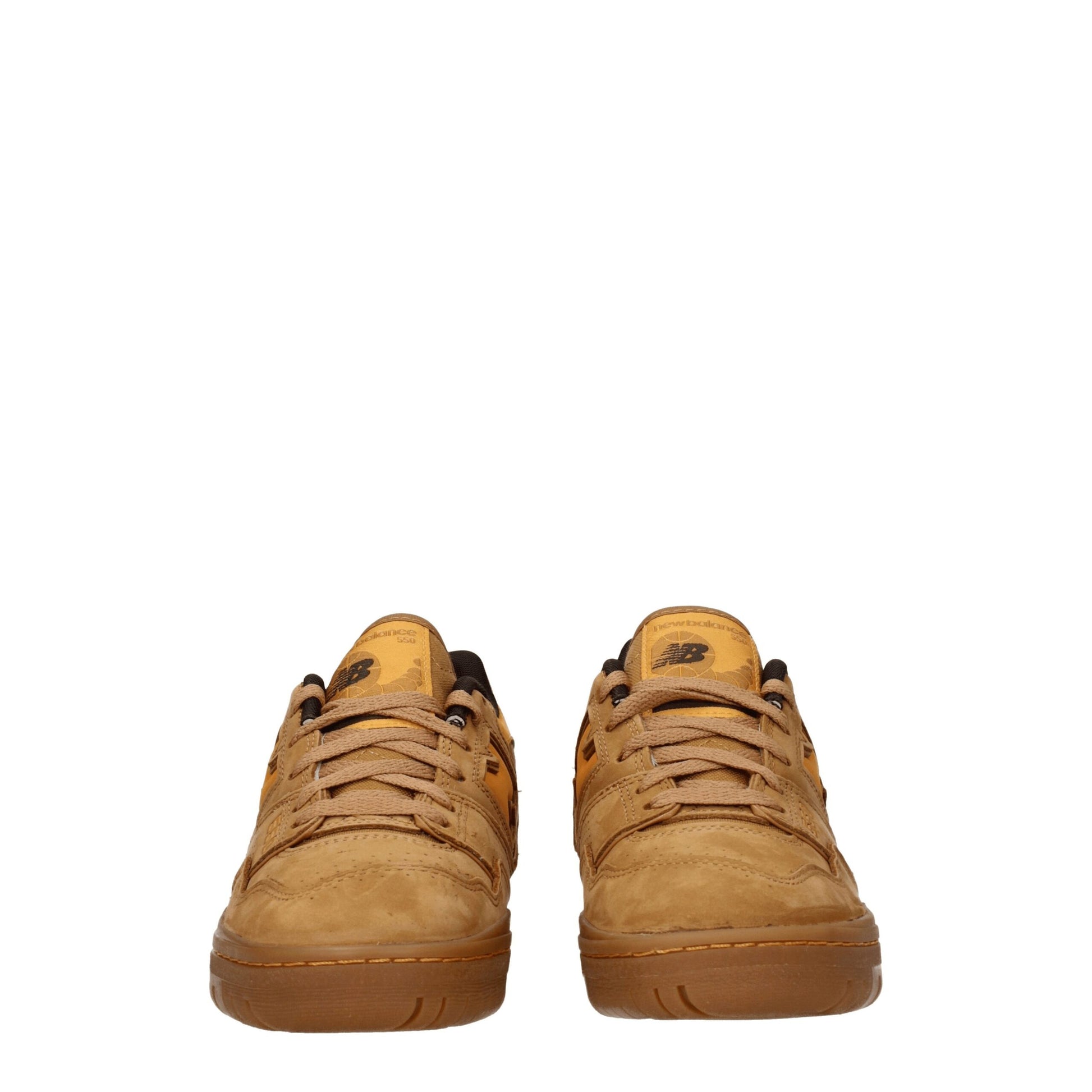 Pair of brown leather sneakers with white laces and black logo on side
