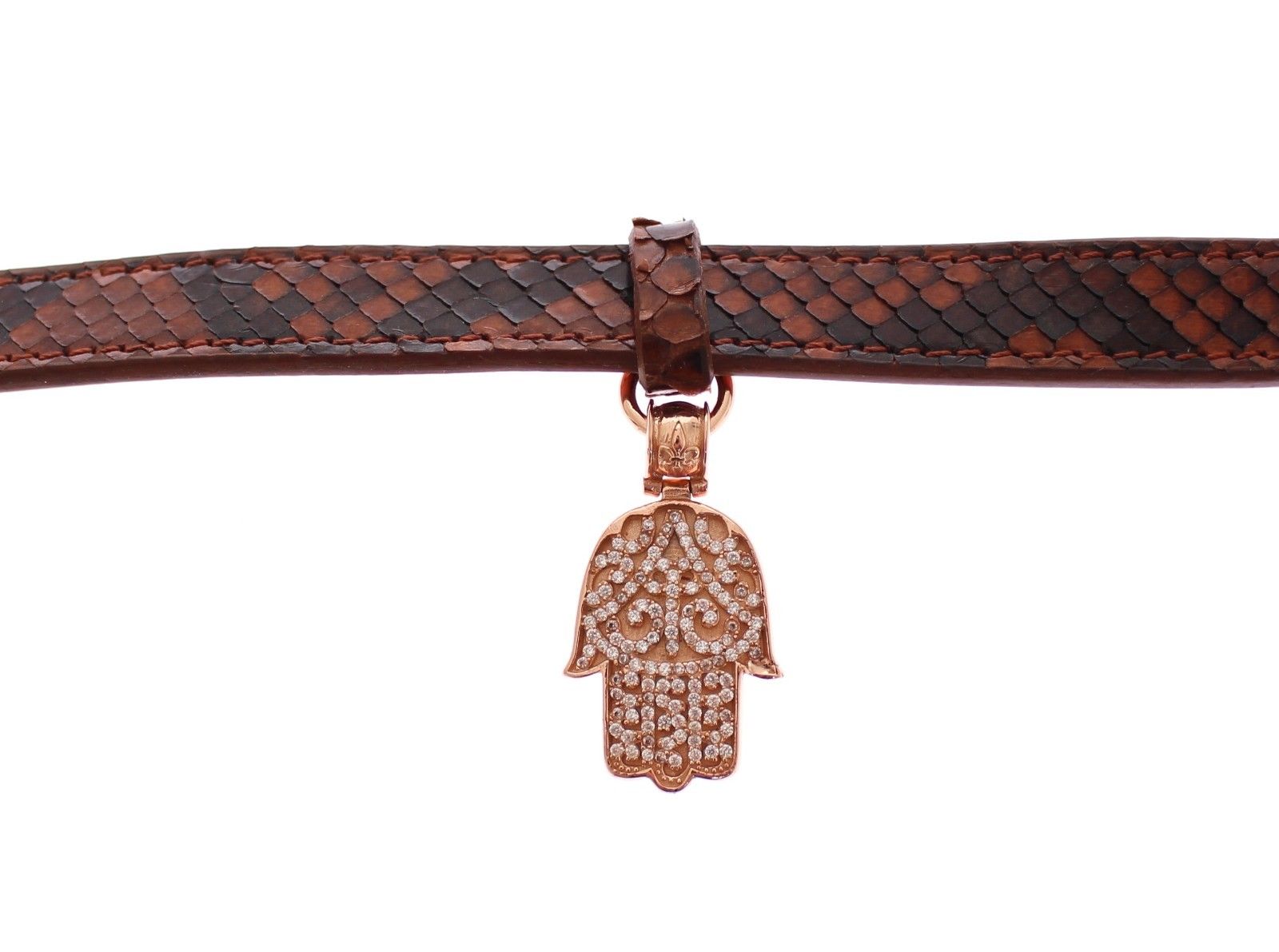 Brown leather bracelet with a gold clasp and a diamond pendant