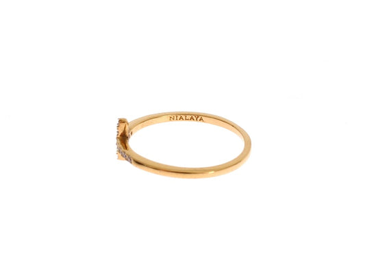 Gold ring with diamond on top