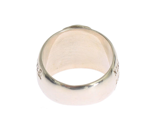 Gold ring on white background