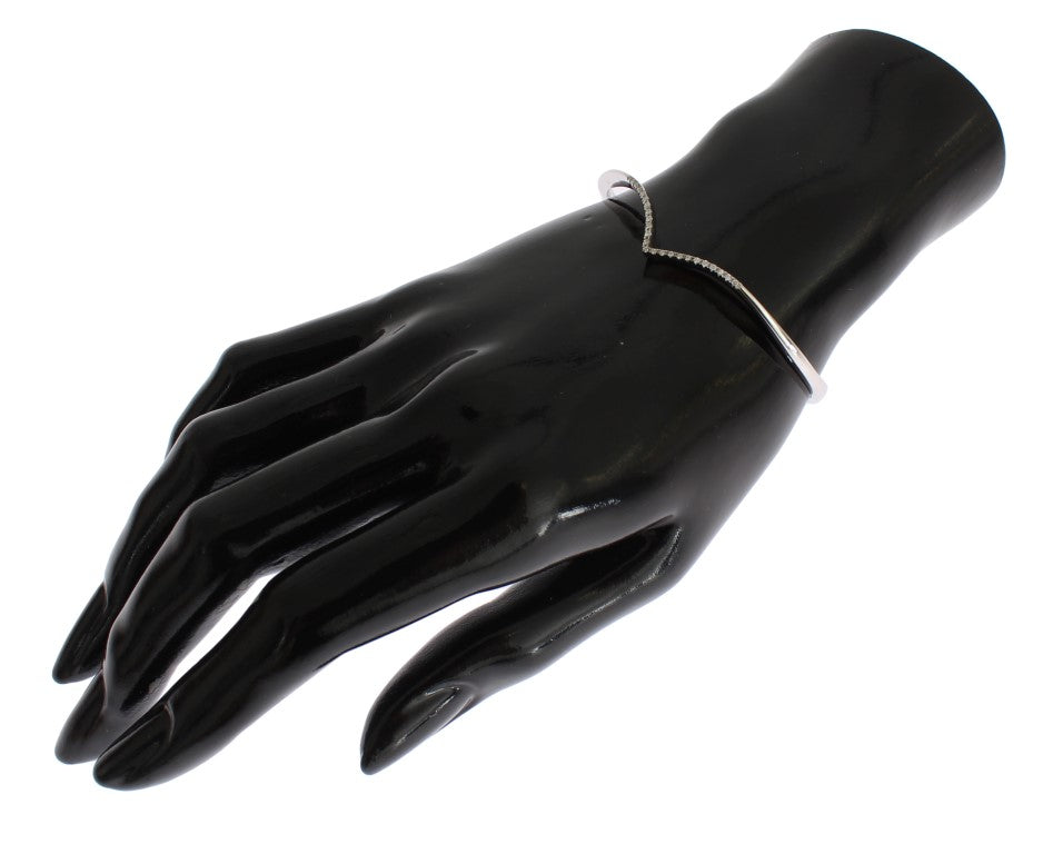 Silver bracelet on black mannequin hand