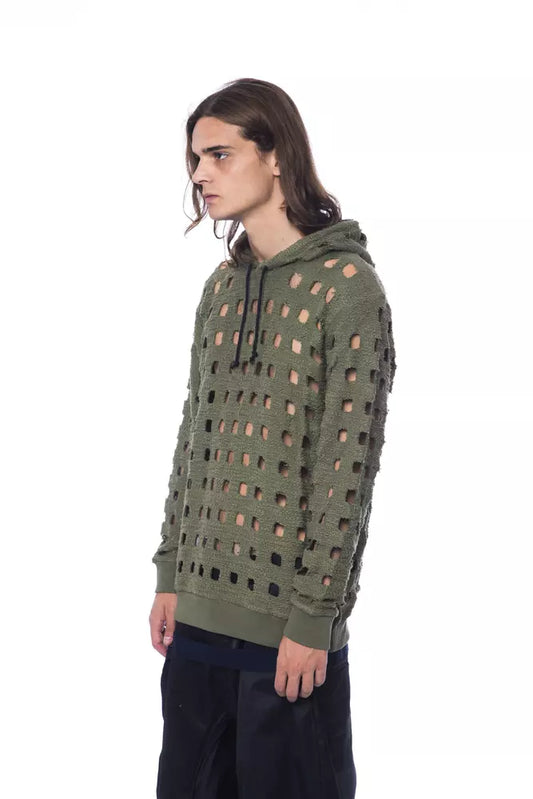 Man wearing olive green hoodie with holes in front