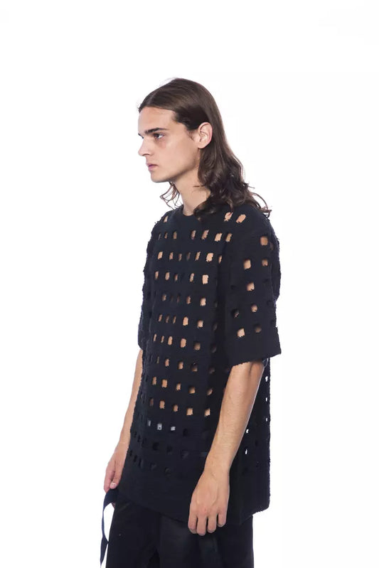 Man wearing black shirt with holes