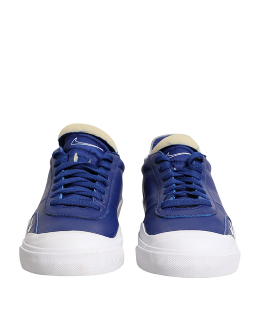 Blue sneakers with white soles