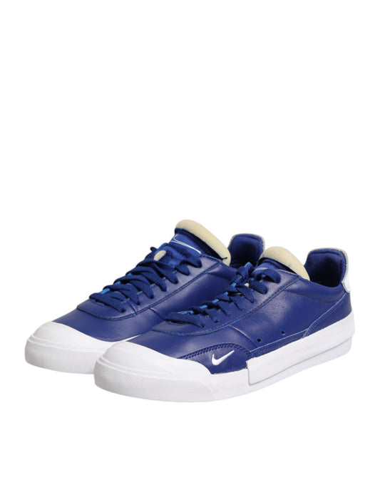 Blue sneakers with white soles
