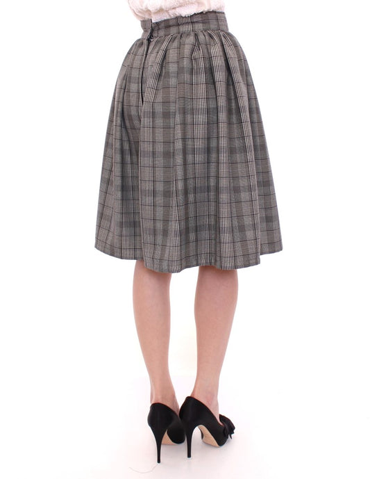 Plaid skirt worn by a woman