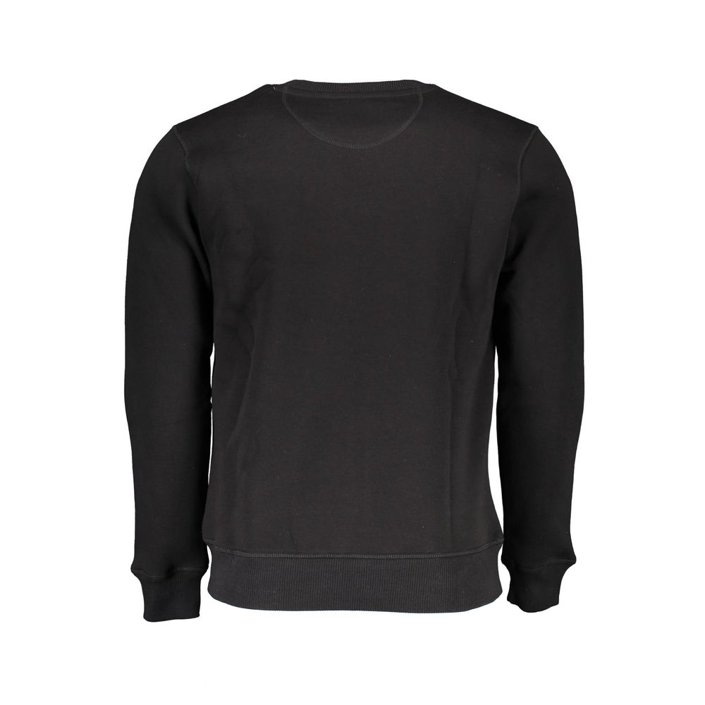 Black long sleeve sweater on hanger