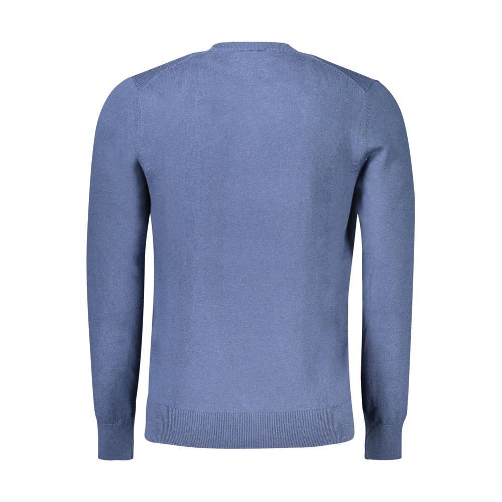 Blue sweater on a hanger
