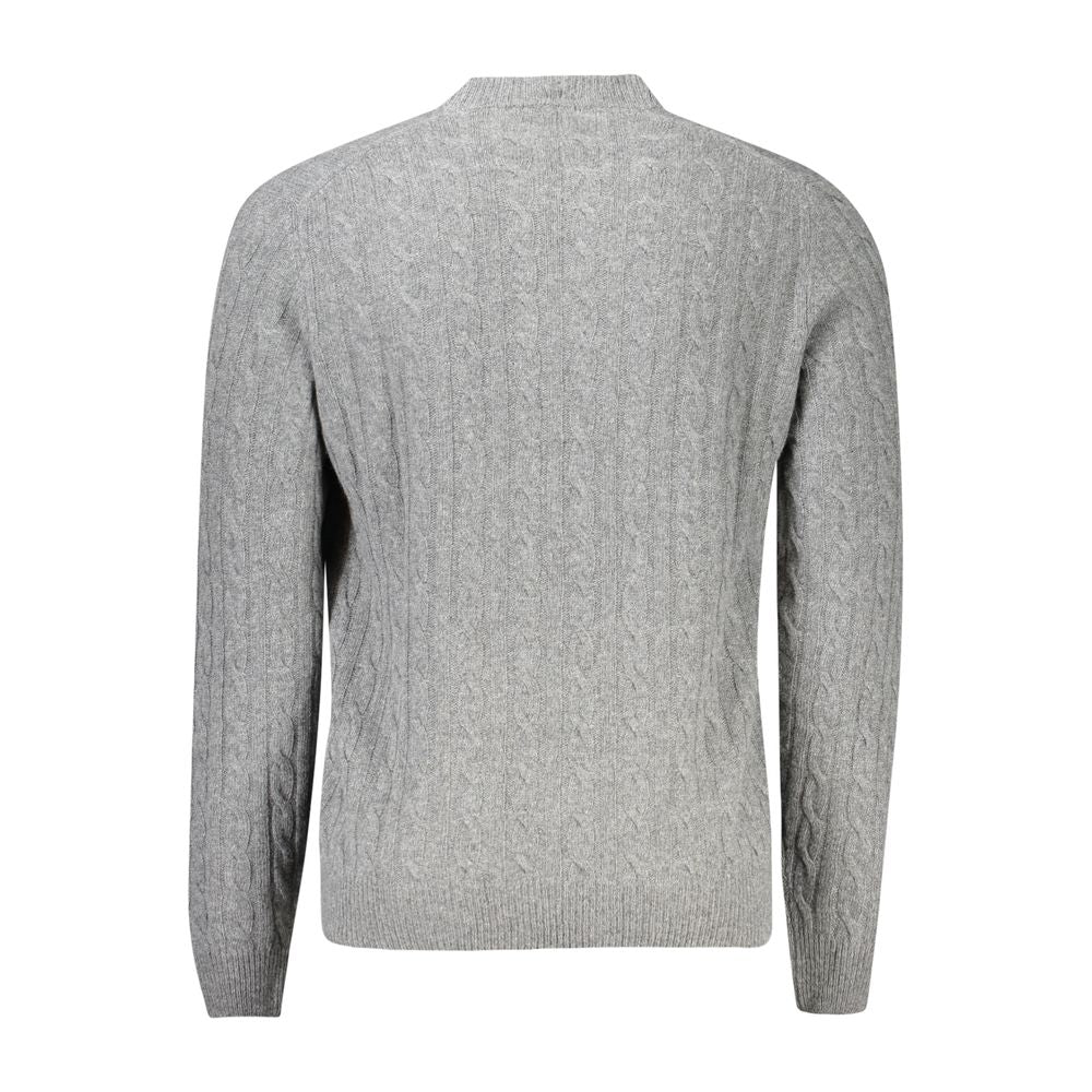 Grey knit sweater on mannequin