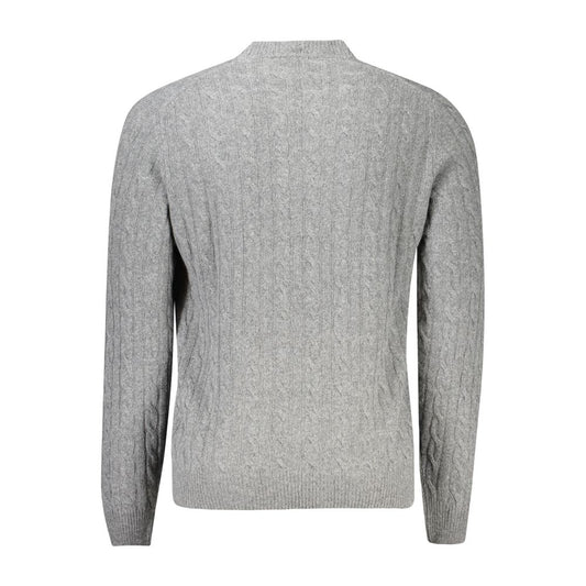 Grey knit sweater on mannequin