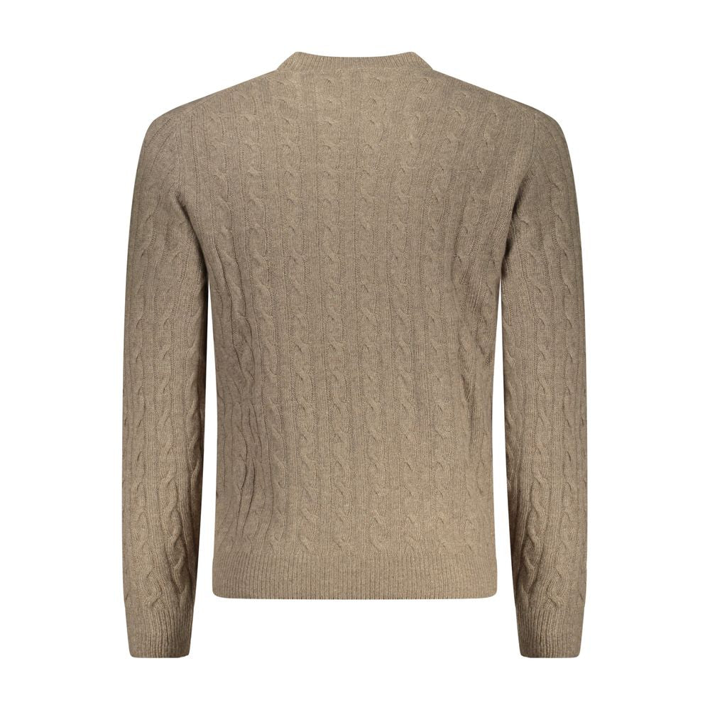 Brown knitted sweater on hanger
