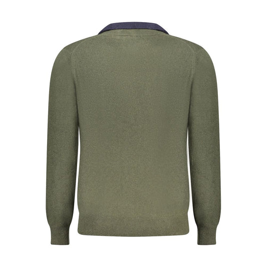 Green wool sweater on mannequin