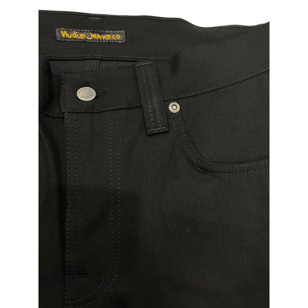 Black denim jeans with a button closure on the waistband