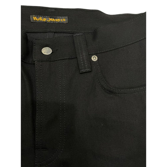 Black denim jeans with a button closure on the waistband