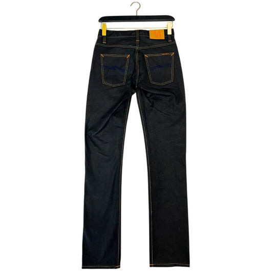 Pair of blue jeans hanging on a hanger
