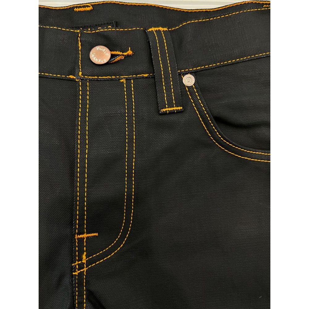 Pair of black jeans with yellow stitching