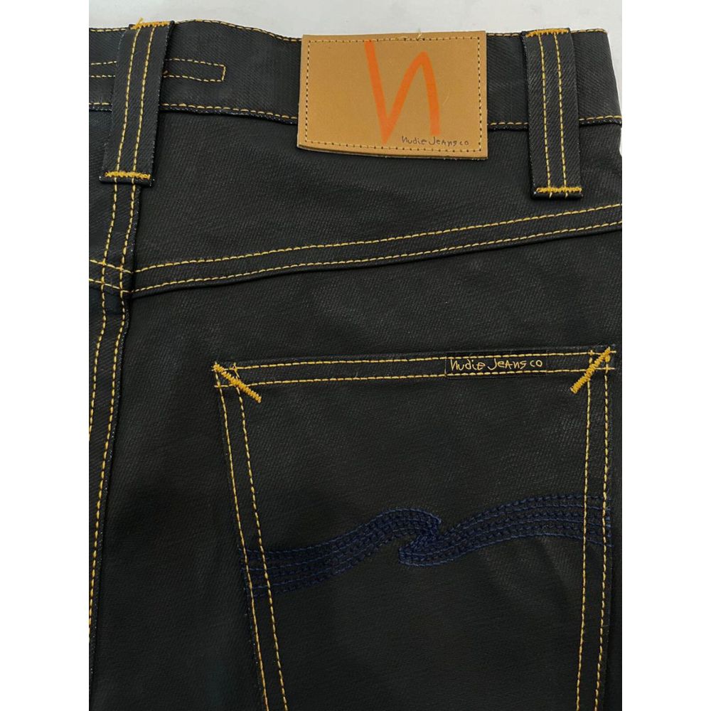 Blue denim jeans with yellow stitching