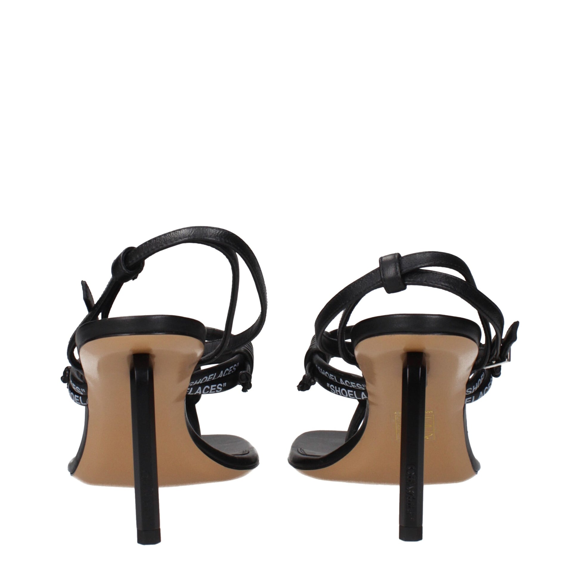 Pair of high heel shoes with black straps