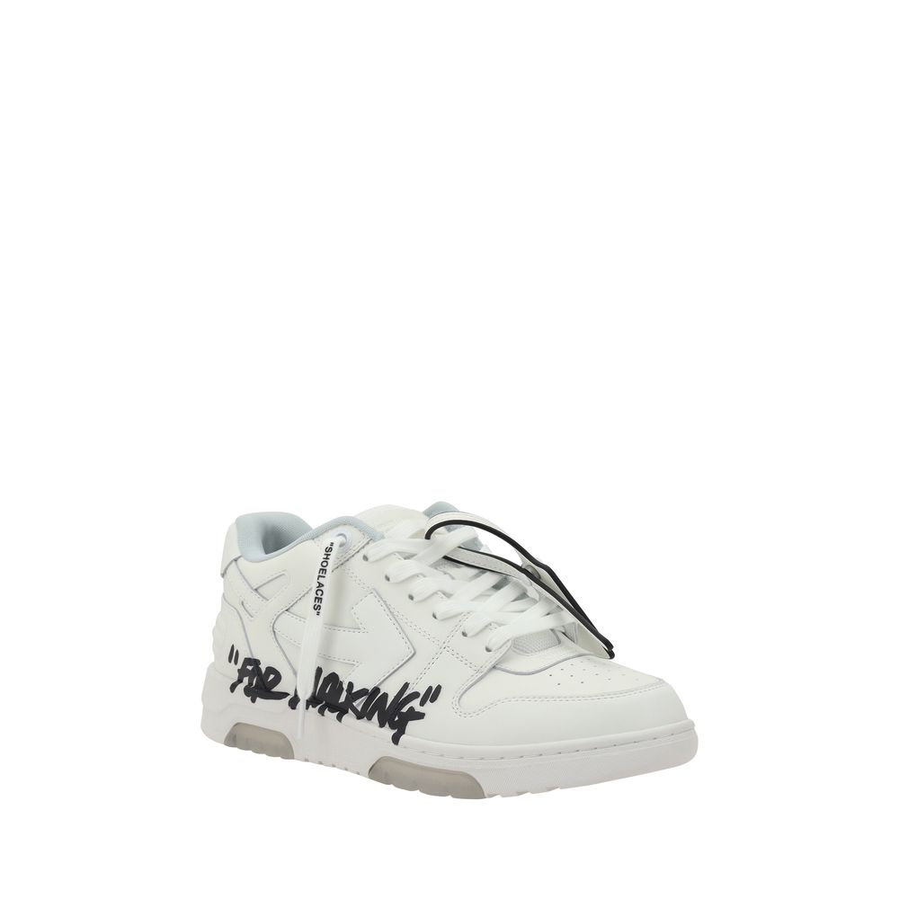 White sneakers with black text on side