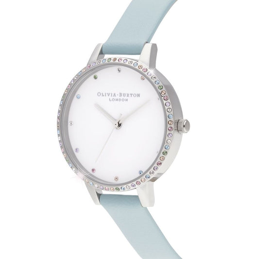 A blue artificial leather watch with a white face, sparkling crystals on the bezel and hands, and a silver buckle