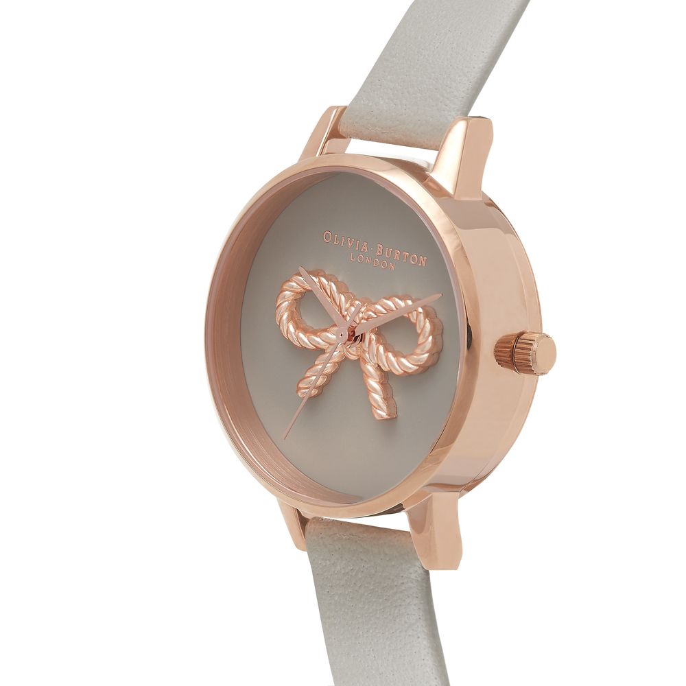 A gray artificial leather watch with a copper-colored band, featuring a bow design on the face and a silver buckle