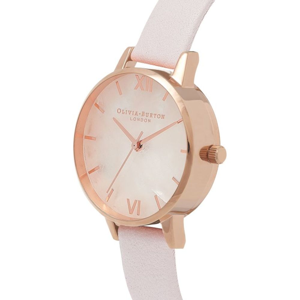 Pink watch with white face and gold accents