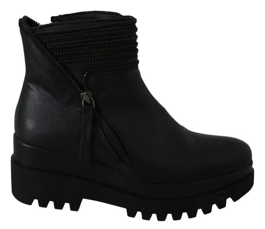 Black leather boot with chunky heel and lace closure