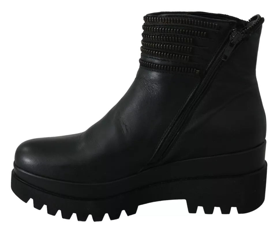 Black leather boot with chunky heel and zipper detailing