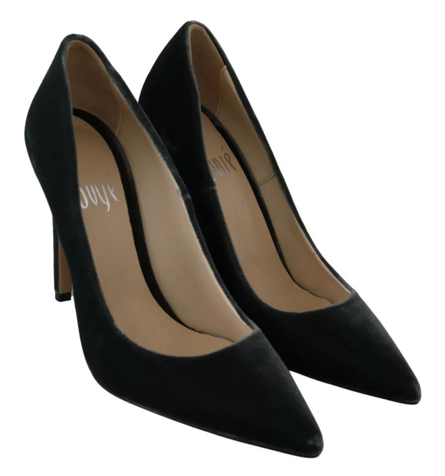 A pair of black velvet dress shoes with a stiletto heel