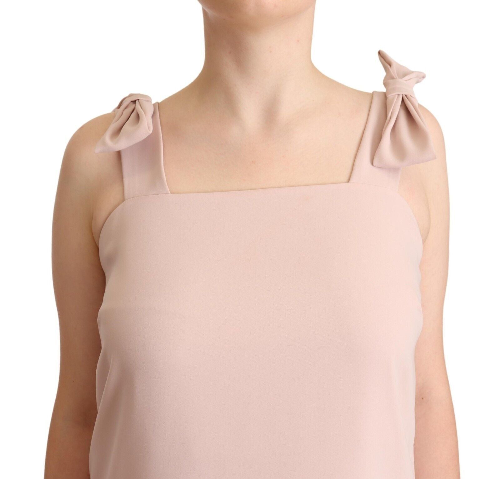 Pink sleeveless midi dress with feather detailing on shoulders and waistband