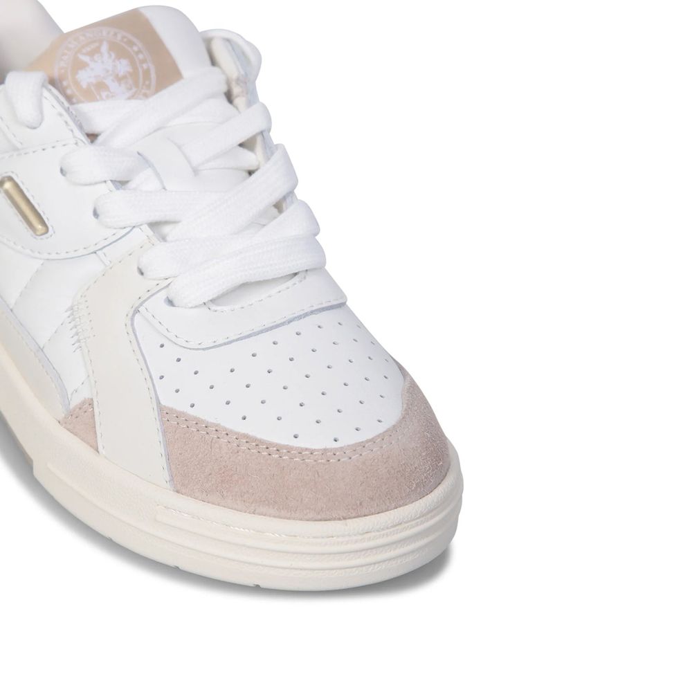 Pair of white sneakers with tan accents, featuring a logo on the tongue and a gold buckle