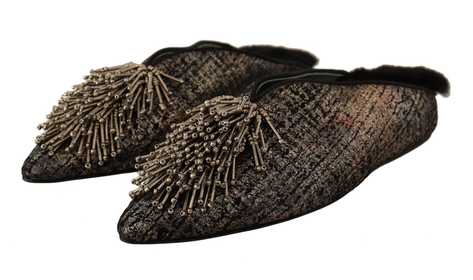 Pair of embellished shoes with spiky decorations on top