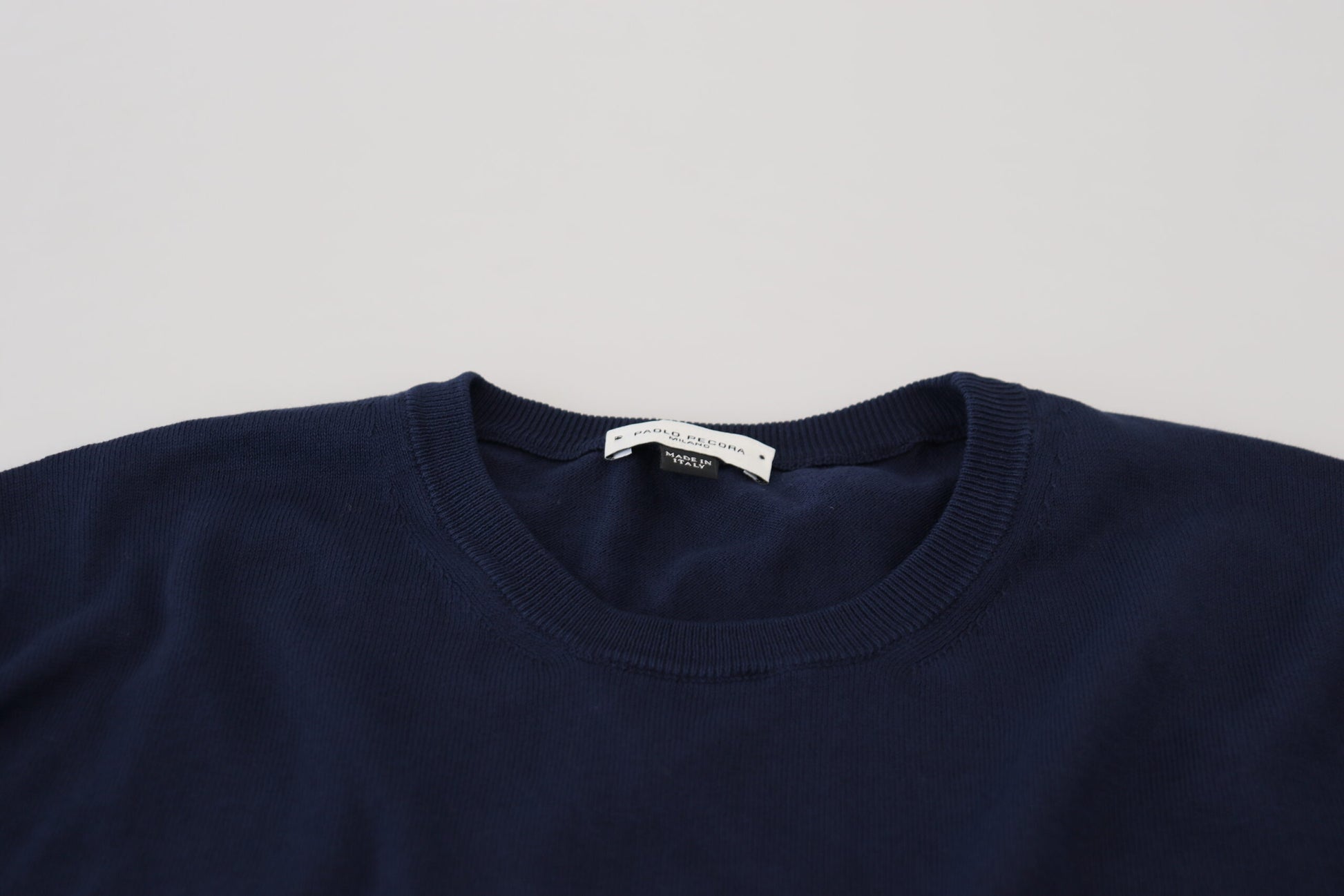 Navy blue crew neck t-shirt on a white background