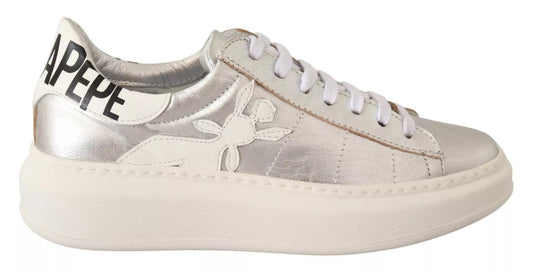 Silver sneaker with white sole and laces
